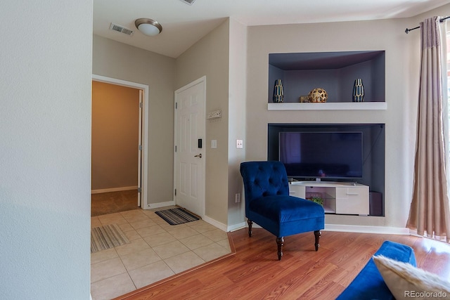 entrance foyer featuring light tile patterned floors