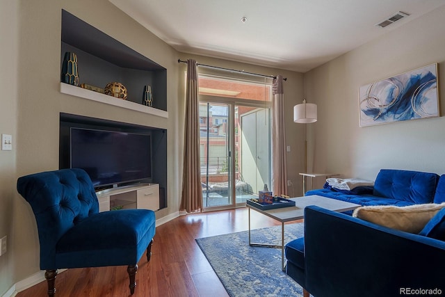 living room featuring hardwood / wood-style floors