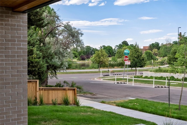 1645 N Osceola St, Denver, CO 80204 - view of asphalt street with sidewalks and traffic signs