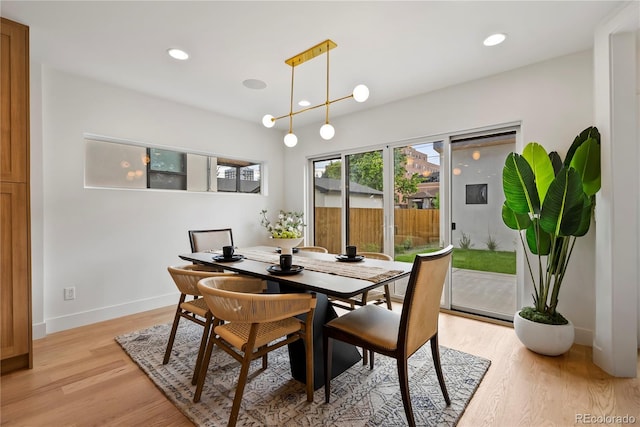 1645 N Osceola St, Denver, CO 80204 - dining area featuring light wood-type flooring and recessed lighting