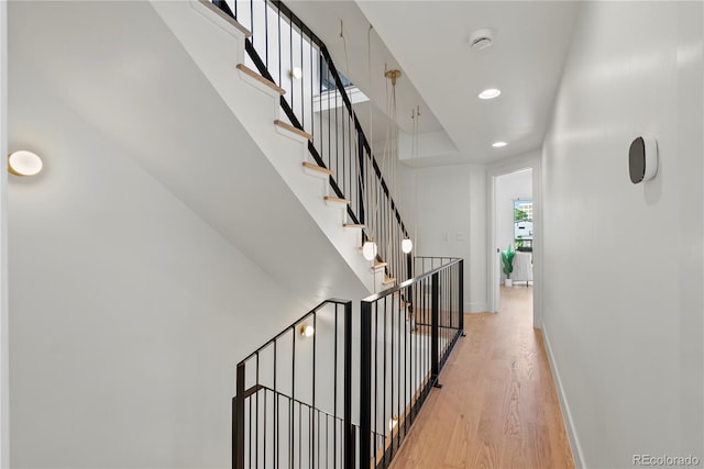 1645 N Osceola St, Denver, CO 80204 - stairway featuring wood finished floors and recessed lighting