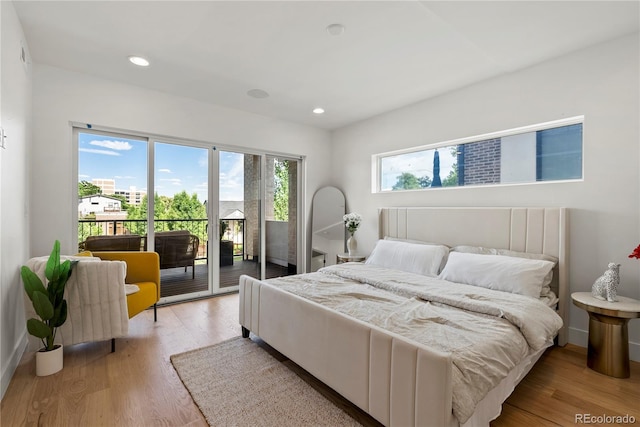 1645 N Osceola St, Denver, CO 80204 - bedroom with access to outside, light wood-style flooring, and recessed lighting