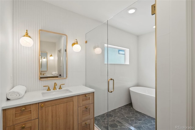 1645 N Osceola St, Denver, CO 80204 - full bath with a soaking tub, vanity, and a shower stall