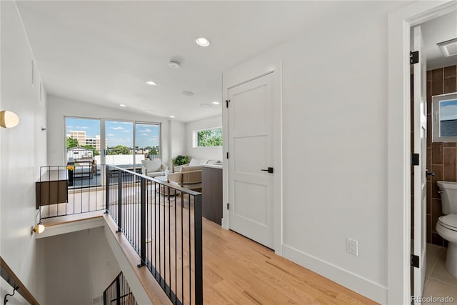 1645 N Osceola St, Denver, CO 80204 - hall featuring an upstairs landing, light wood-style floors, recessed lighting, and a water view
