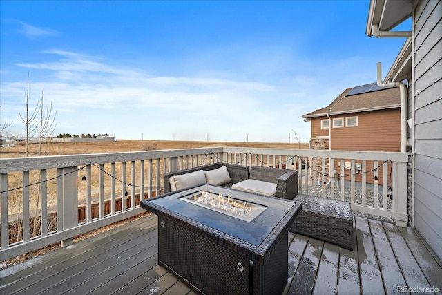 deck featuring a fire pit