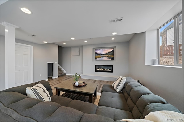 living room with hardwood / wood-style floors