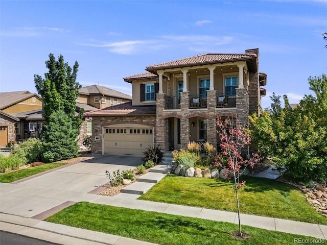 mediterranean / spanish home with stucco siding, a balcony, a garage, stone siding, and driveway