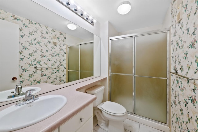 full bathroom with vanity, tile patterned flooring, a stall shower, and wallpapered walls