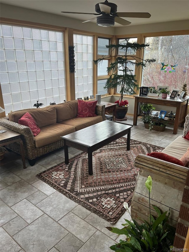 sunroom / solarium with ceiling fan and a wealth of natural light