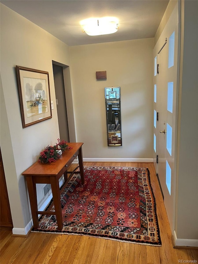 interior space with hardwood / wood-style floors