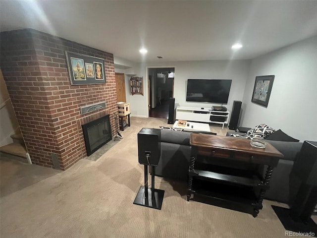 carpeted living room with a brick fireplace