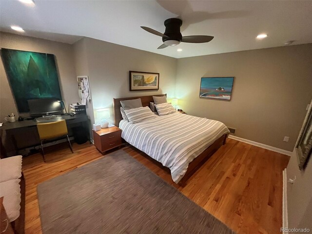 701 S Clayton St, Denver, CO 80209 - bedroom featuring wood finished floors, recessed lighting, an office area, and a ceiling fan