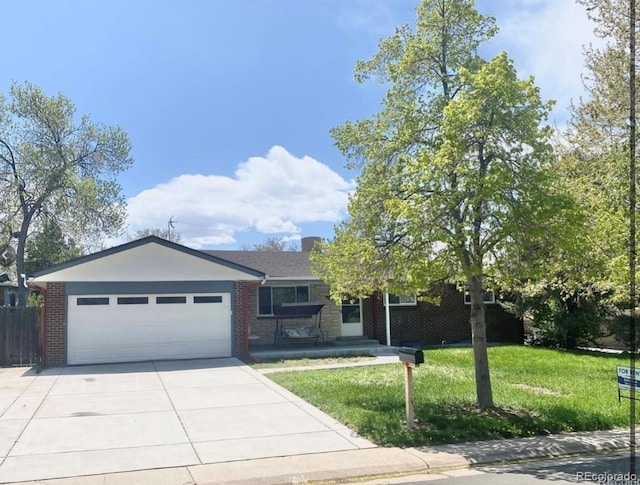 13024 E Alaska Pl, Aurora, CO 80012 - single story home featuring an attached garage, concrete driveway, and brick siding