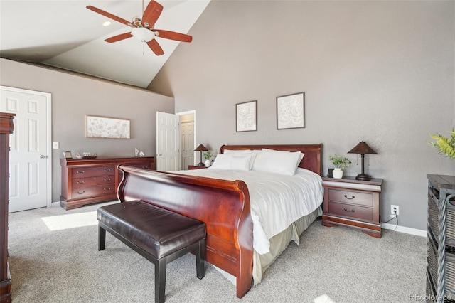 carpeted bedroom featuring high vaulted ceiling and ceiling fan