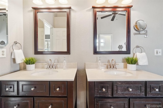 bathroom featuring vanity and ceiling fan