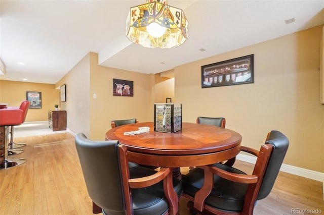 dining room with light hardwood / wood-style flooring