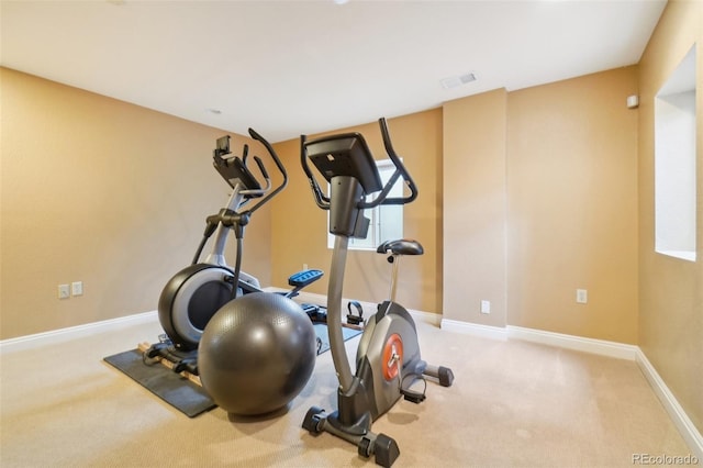 workout room with light carpet