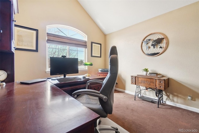 office space with lofted ceiling and carpet flooring