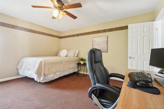 bedroom with ceiling fan and dark colored carpet