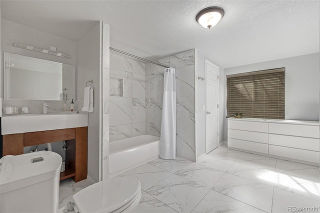 full bathroom with toilet, marble finish floor, shower / bathtub combination with curtain, a textured ceiling, and vanity