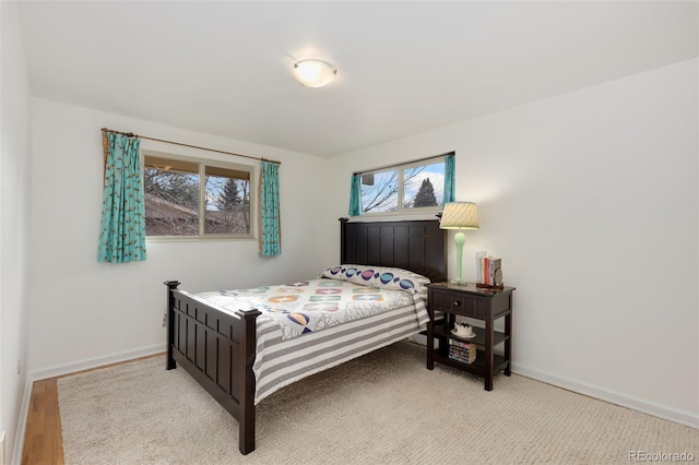 bedroom with light hardwood / wood-style floors