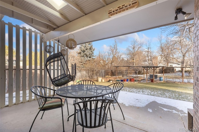 view of snow covered patio