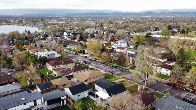 bird's eye view featuring a water and mountain view and a residential view