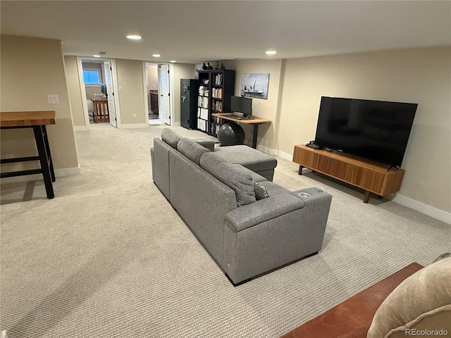 living room with baseboards, recessed lighting, and light colored carpet