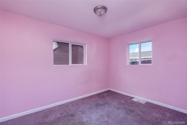 empty room with carpet floors