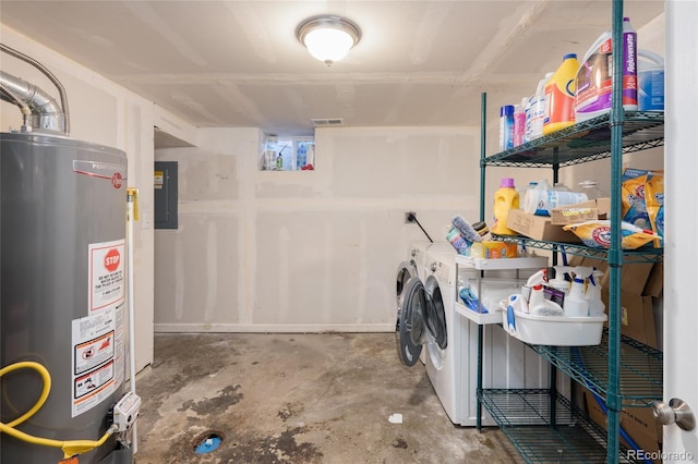 clothes washing area featuring separate washer and dryer, gas water heater, and electric panel