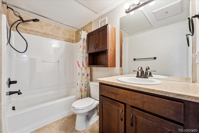 full bathroom featuring tile patterned floors, toilet, a textured ceiling, vanity, and shower / bath combo