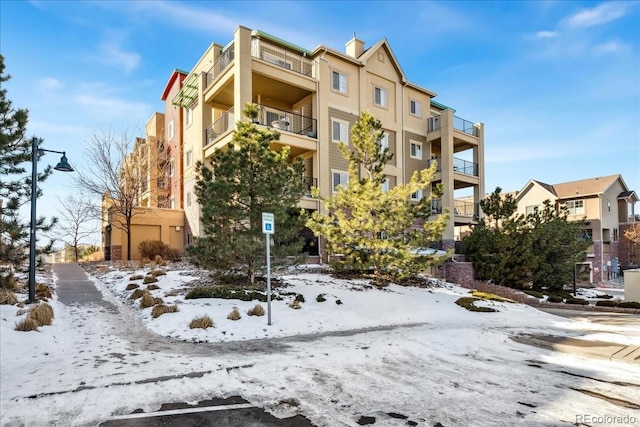 view of snow covered building