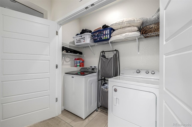 11027 Sunshimmer Cir, Parker, CO 80134 - washroom featuring separate washer and dryer and light tile patterned floors