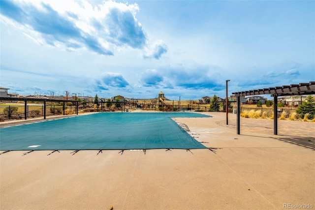 11027 Sunshimmer Cir, Parker, CO 80134 - community pool featuring a patio and a pergola