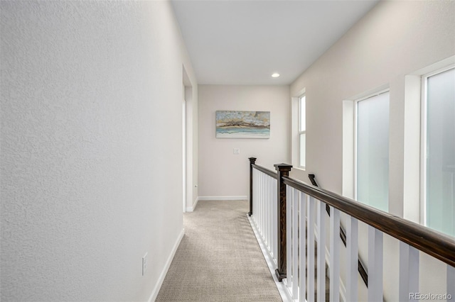 11027 Sunshimmer Cir, Parker, CO 80134 - hallway with light carpet, baseboards, an upstairs landing, and recessed lighting