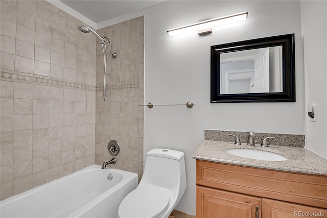 bathroom with tub / shower combination, toilet, and vanity