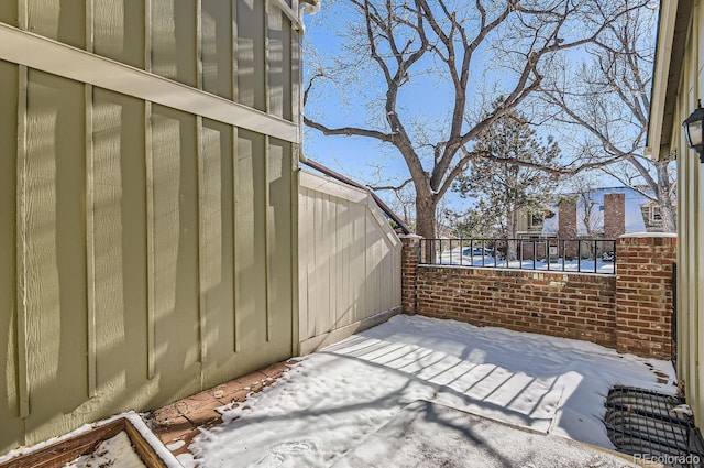 view of snow covered patio