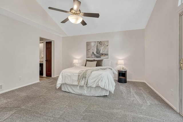 bedroom featuring baseboards, carpet, and vaulted ceiling