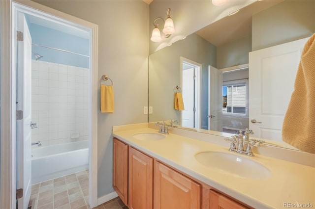 bathroom with vanity and shower / tub combination