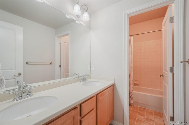 bathroom with vanity, tile patterned floors, and shower / bath combination with curtain