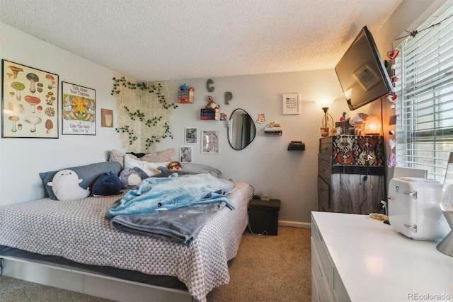 carpeted bedroom with a textured ceiling