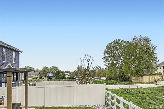 view of yard with fence