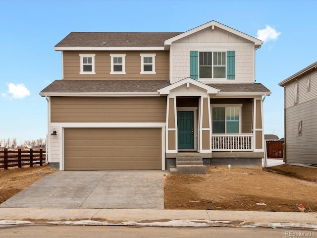 view of front facade with driveway, a garage, a shingled roof, fence, and a porch