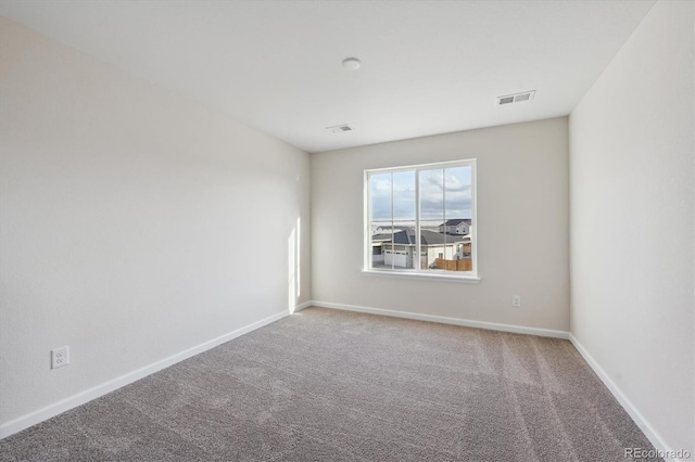 empty room featuring carpet