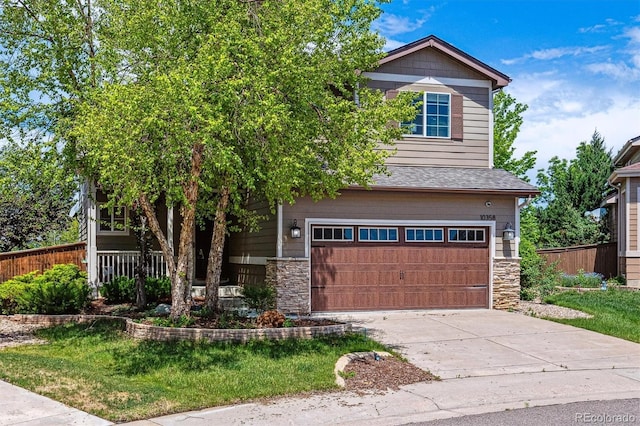 10358 Kelliwood Way, Highlands Ranch, CO 80126 - craftsman-style home with stone siding, an attached garage, and concrete driveway