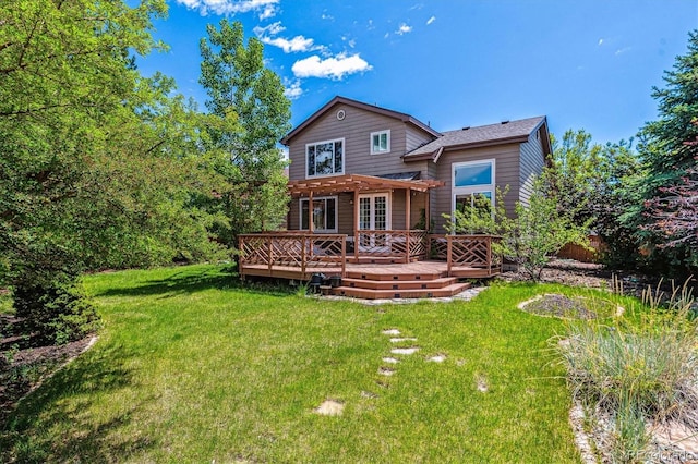 10358 Kelliwood Way, Highlands Ranch, CO 80126 - rear view of property with a yard and a wooden deck