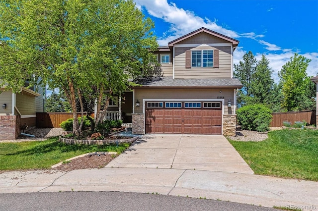 10358 Kelliwood Way, Highlands Ranch, CO 80126 - view of front of home featuring a garage, stone siding, and concrete driveway