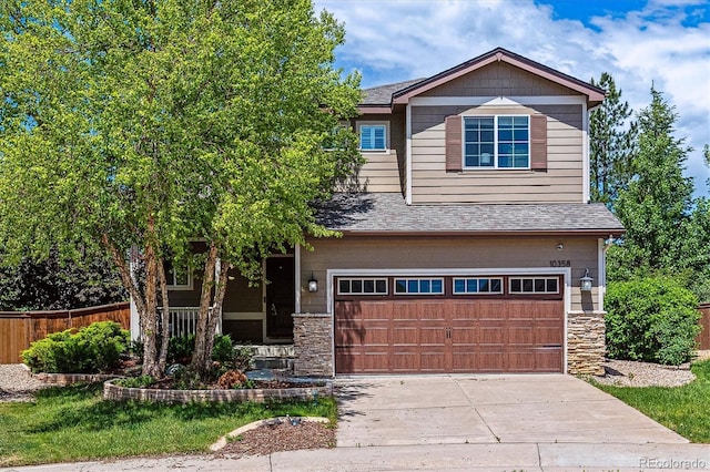 10358 Kelliwood Way, Highlands Ranch, CO 80126 - craftsman-style home with an attached garage, stone siding, concrete driveway, roof with shingles, and a porch
