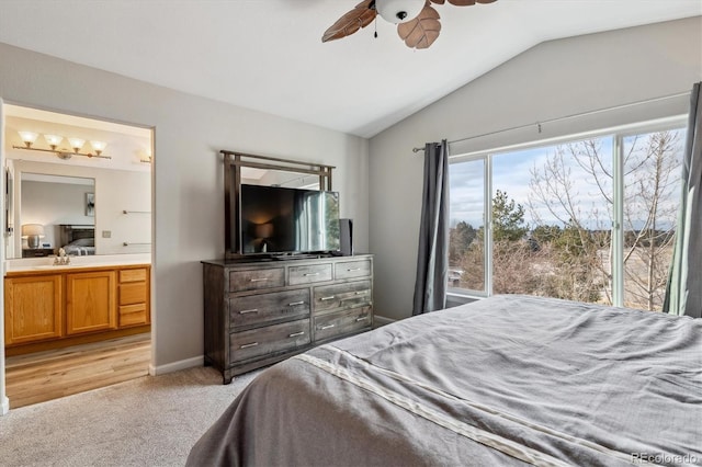 10358 Kelliwood Way, Highlands Ranch, CO 80126 - bedroom featuring lofted ceiling, light carpet, ensuite bathroom, a ceiling fan, and a sink