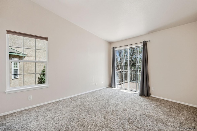 6087 Colony Cir, Colorado Springs, CO 80919 - empty room with carpet flooring, baseboards, and vaulted ceiling